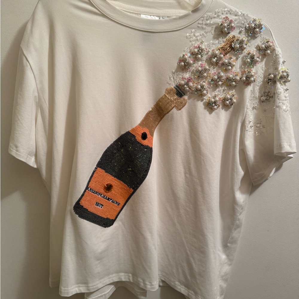 White T-Shirt with Champagne Bottle Design. Queen of Sparkles